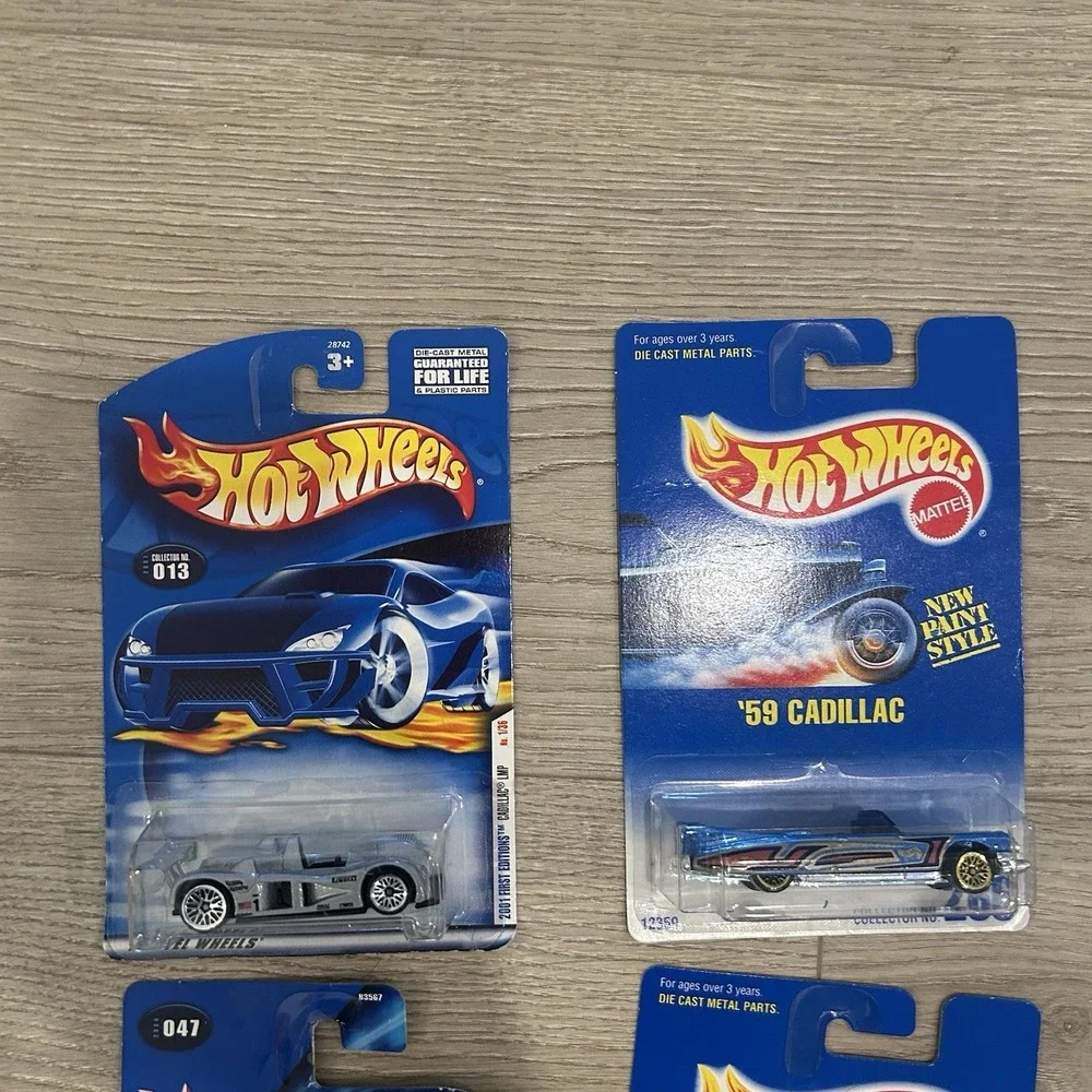 Hot Wheels Lot Of 4 Cadillac Diecast Cars 1:64 NIB